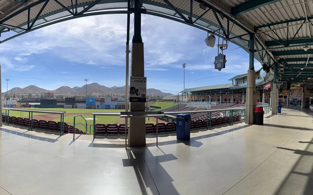 Ballpark concourse overlooking the field and stands